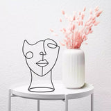 Statue visage abstrait
