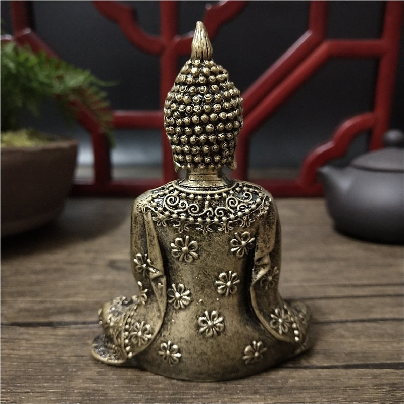Statue bouddha prière dos